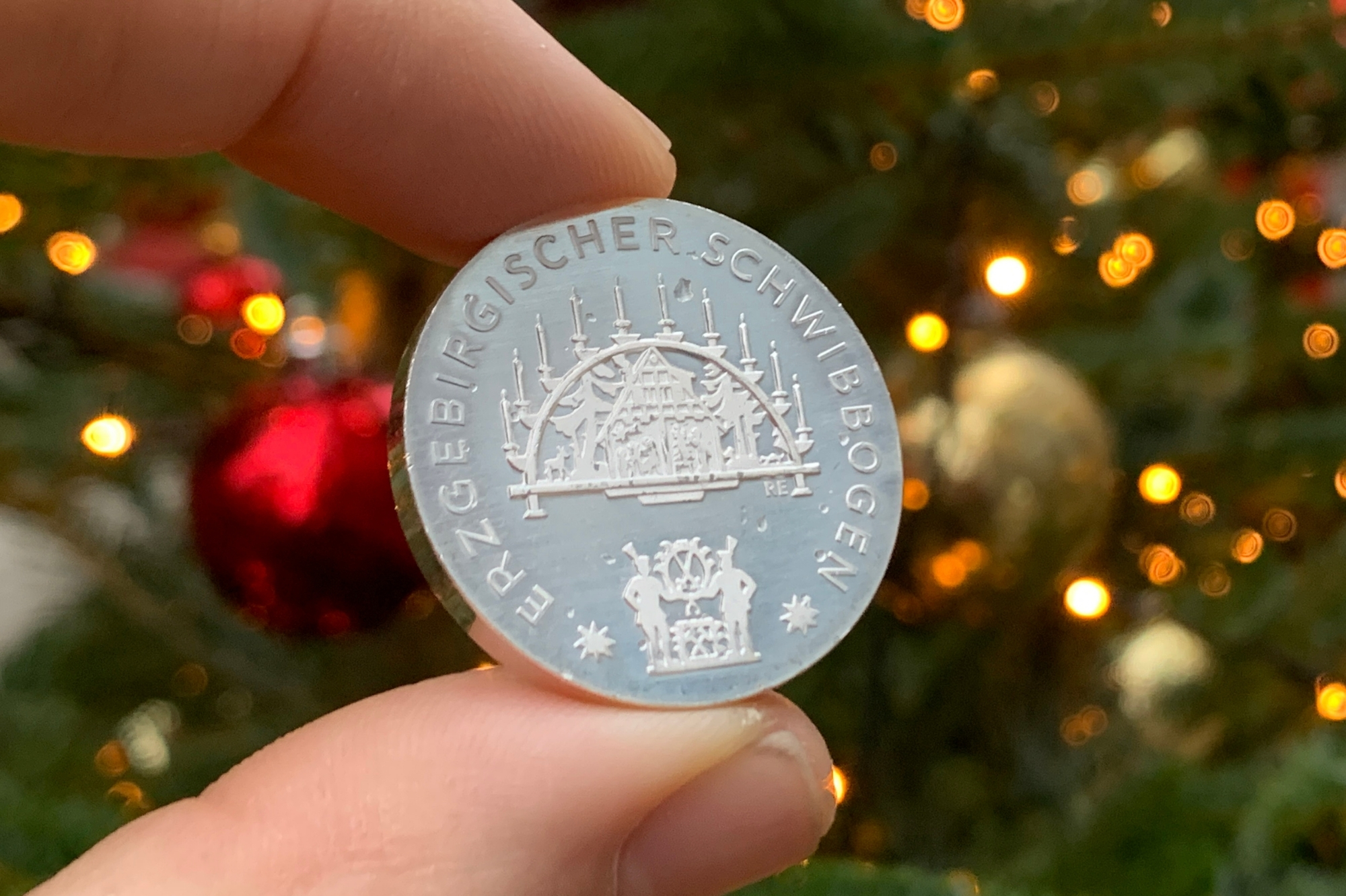 Die 25-Euro-Silbermünze 2023 „Weihnachten – Erzgebirgischer Schwibbogen“